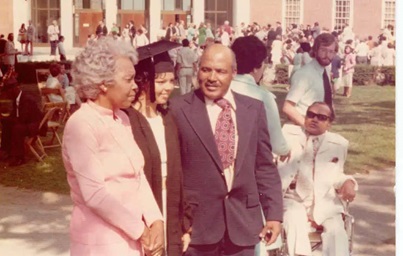 Image of Doctor Freda Lewis-Hall with her mother and father at her graduation from The Johns Hopkins University in 1976