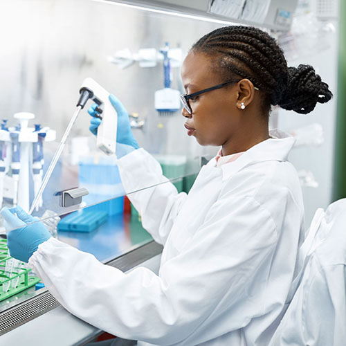 female biopharmaceutical technician working in a laboratory